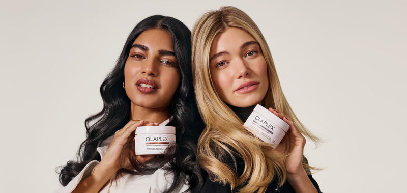 Two women holding the Rich Hydration Mask and Weightless Nourishing Mask