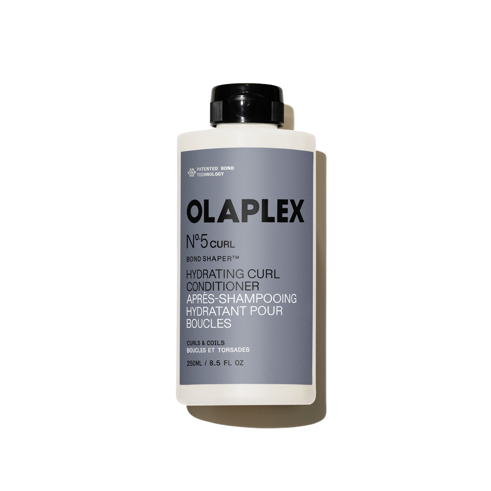 Botella de 250 ml de Olaplex Nº.5CURL Bond Shaper Hydrating Curl Conditioner sobre un fondo blanco liso. - main view