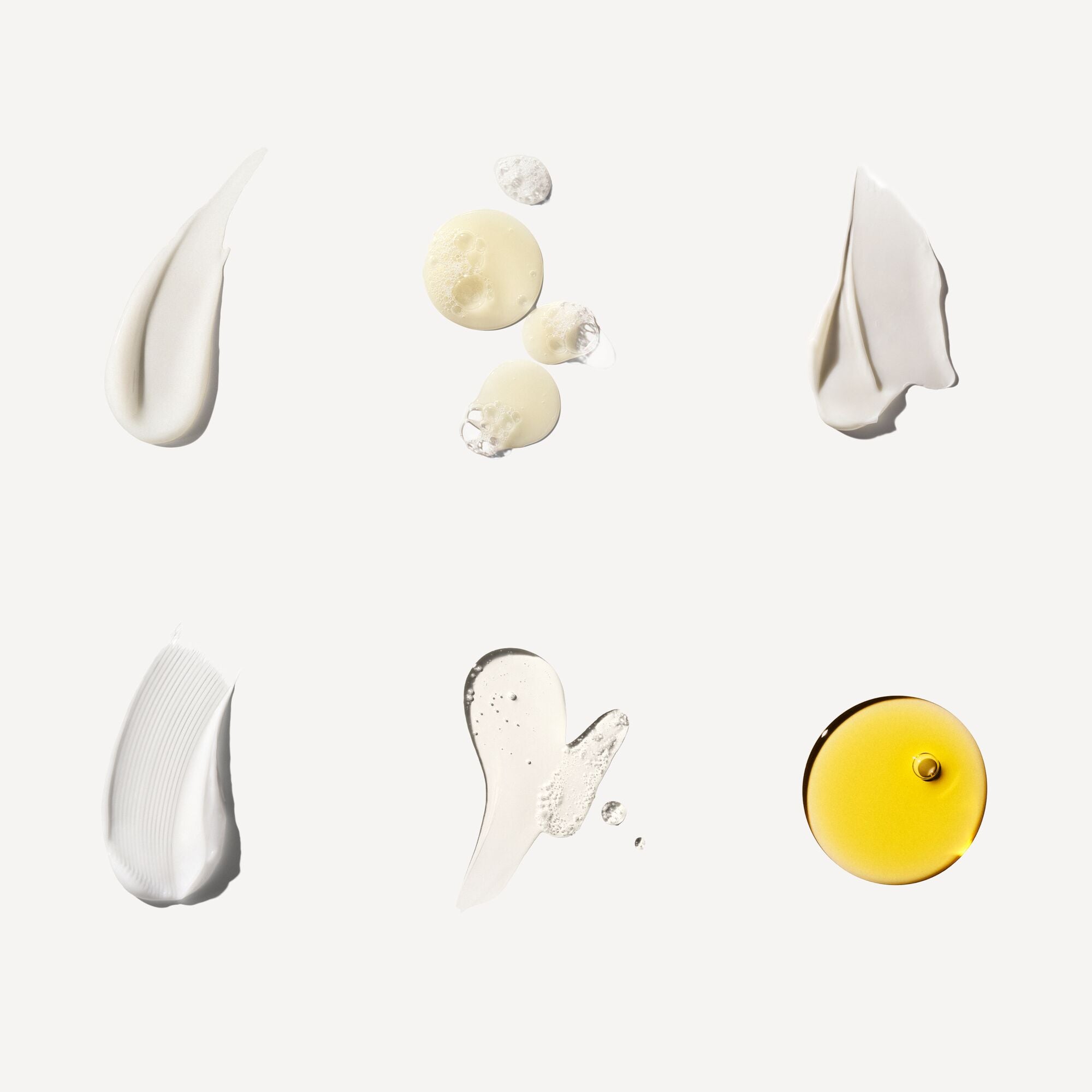 Nº.3 HAIR PERFECTOR®
Champú Nº.4
Nº.5 CONDITIONER
Nº.6 BOND SMOOTHER®
Nº.9 BOND PROTECTOR NOURISHING HAIR SERUM
OLAPLEX N°.7 Bonding Oil™

Muestras de productos cremosos sobre fondo blanco