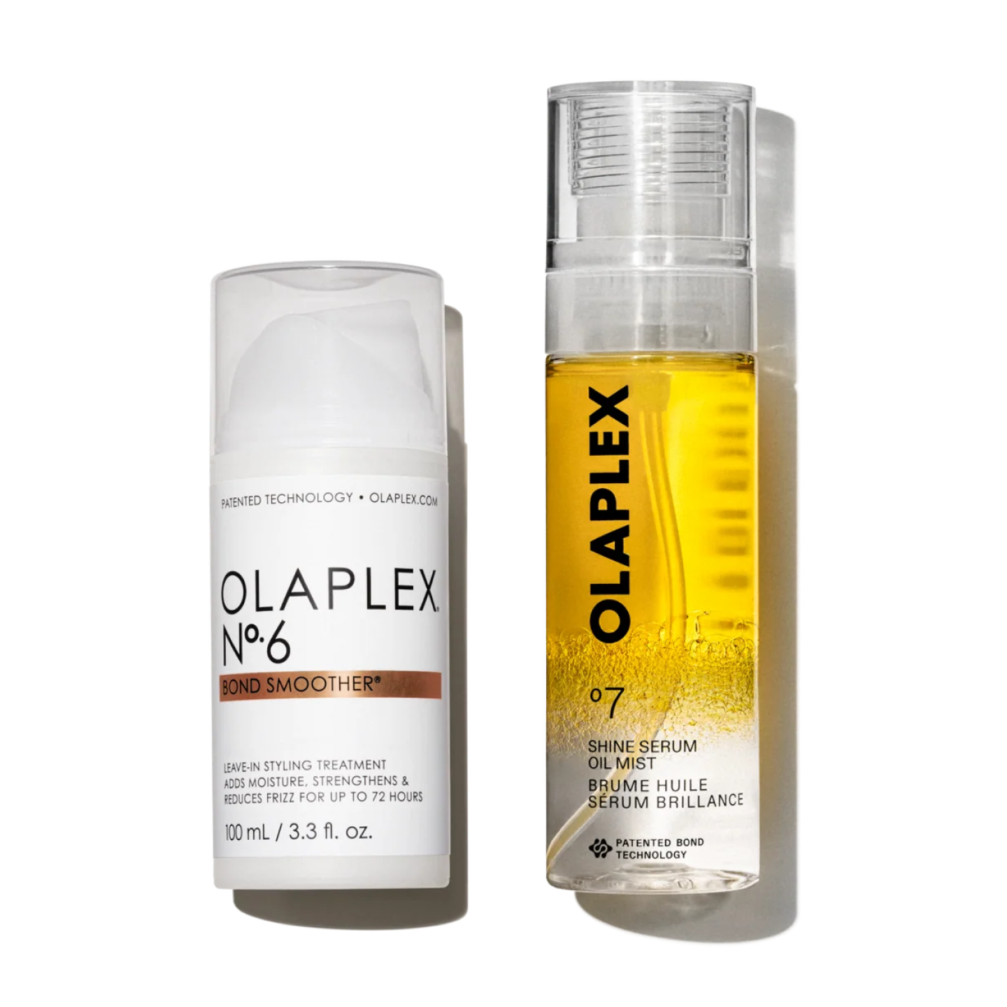 Dos productos para el cabello de Olaplex colocados uno al lado del otro sobre un fondo blanco limpio. A la izquierda está el Olaplex Nº.6 Bond Smoother, un envase blanco con dosificador y tapa transparente. A la derecha hay un envase ligeramente más alto de Olaplex Nº.7 Shine Serum Oil Mist, una botella transparente con pulverizador que muestra en su interior un líquido de un vibrante tono dorado-amarillo. Ambas botellas presentan el diseño minimalista clásico de la marca con letras negras nítidas.
