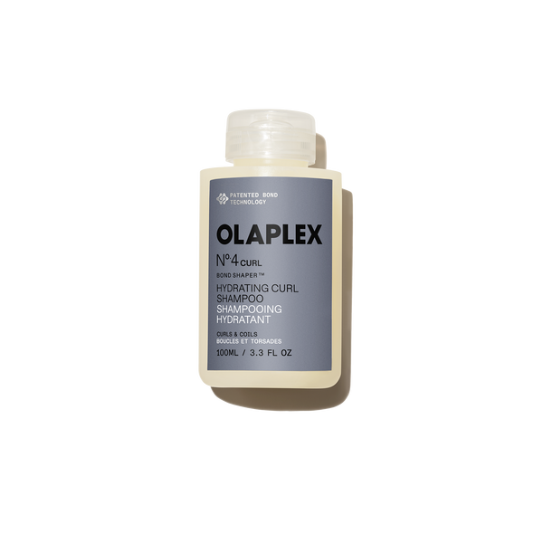 hover

Olaplex Nº.4CURL Bond Shaper Hydrating Curl Shampoo texture shot. 

Clear gel like goop on a gray background - alternate view