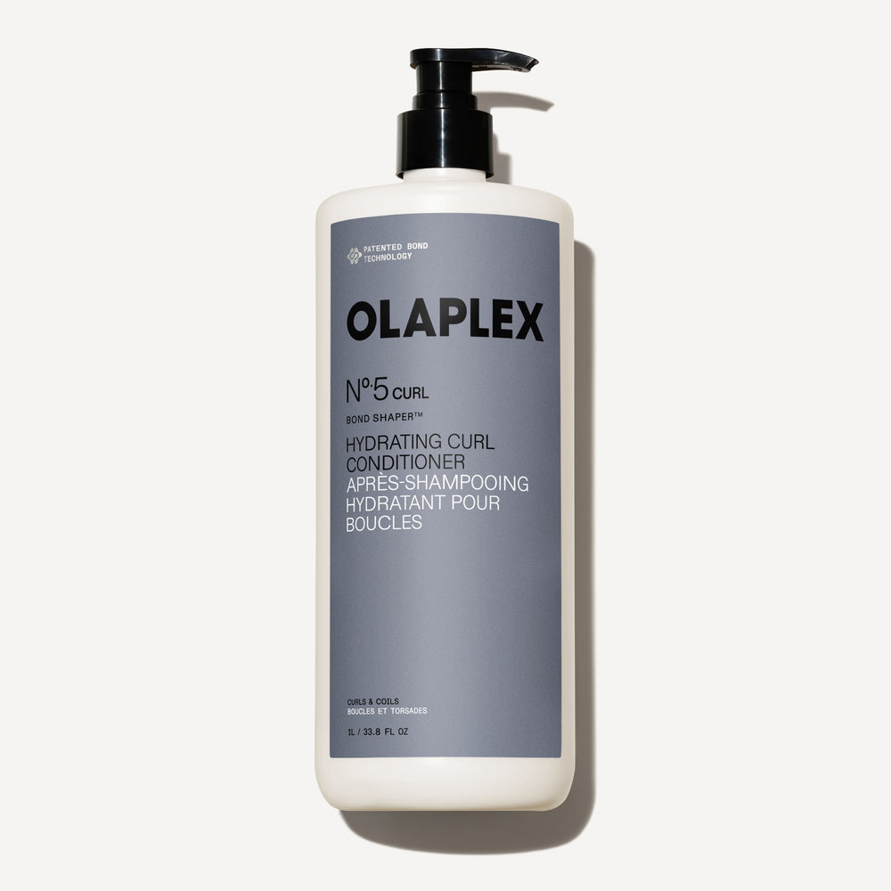 hover 

Una muestra densa y cremosa de color blanco del OLAPLEX Nº.5CURL Hydrating Curl Conditioner, que presenta una textura suave y rica sobre un fondo gris claro. - alternate view