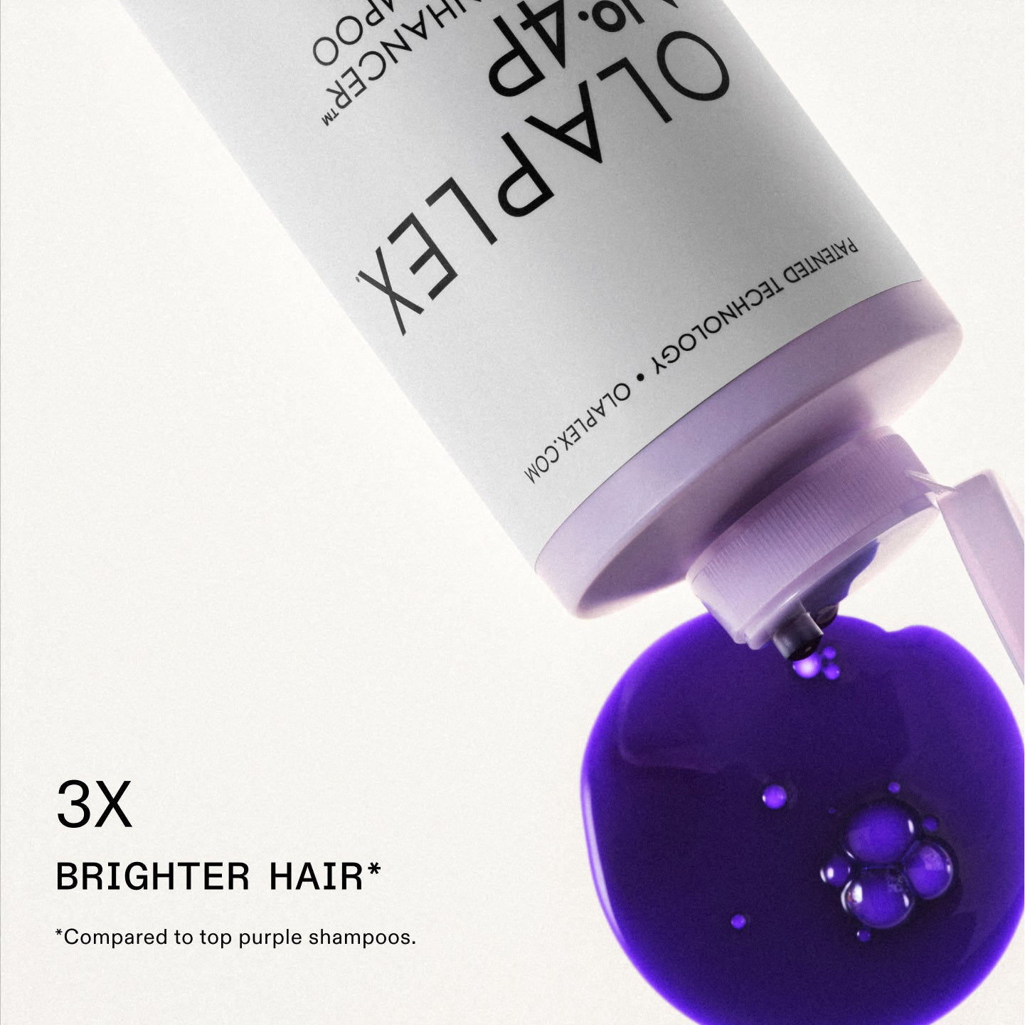 PELO 3 VECES MÁS BRILLANTE* *****Comparado con los mejores champús morados.

También hay texto en la botella que dice: OLAPLEX y TECNOLOGÍA PATENTADA • OLAPLEX.COM