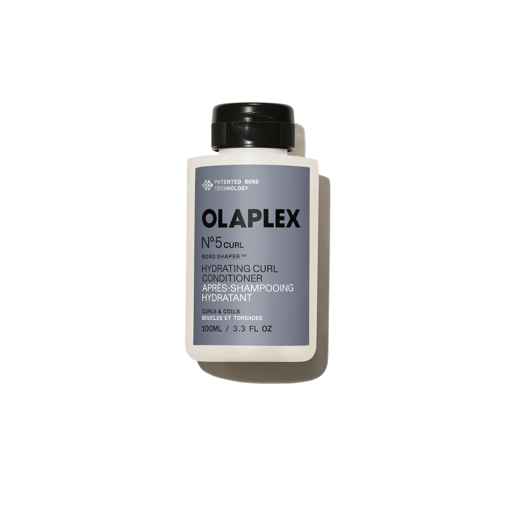 hover 

Una muestra densa y cremosa de color blanco del OLAPLEX Nº.5CURL Hydrating Curl Conditioner, que presenta una textura suave y rica sobre un fondo gris claro. - alternate view