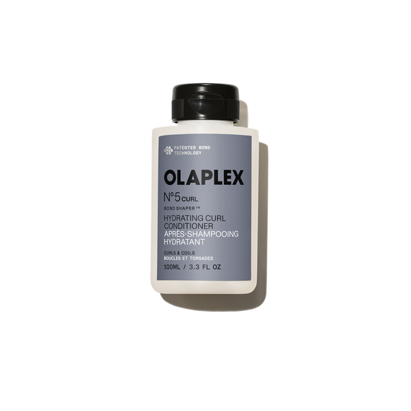 hover 

A thick, creamy white swatch of OLAPLEX Nº.5CURL Hydrating Curl Conditioner showing a smooth, rich texture on a light gray background. - alternate view