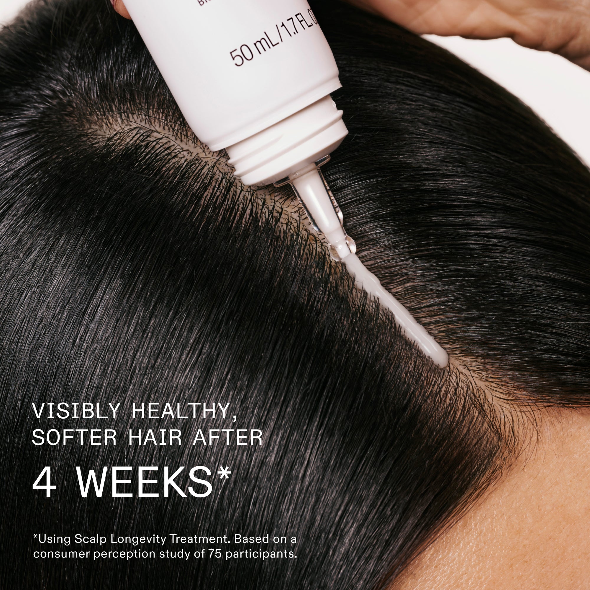 A close-up view of a person applying a hair treatment product directly to their scalp from a white tube with a precision applicator tip. The product forms a smooth, white line along the hair part. Bold white text in the bottom-left corner reads "VISIBLY HEALTHY, SOFTER HAIR AFTER 4 WEEKS*" with a smaller footnote below.