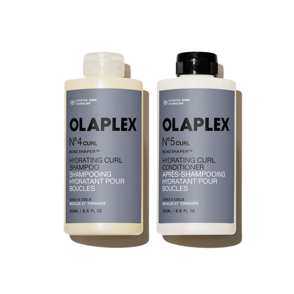 OLAPLEX Nº.4CURL Hydrating Curl Shampoo and Nº.5CURL Hydrating Curl Conditioner 250ML duo on a transparent background. - main view